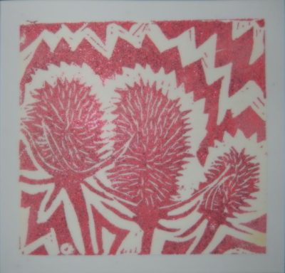 3 sparkly red teasel heads.