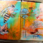 Book pages showing bee and colourful background