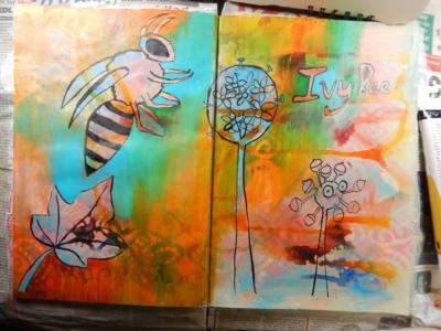 Book pages showing bee and colourful background