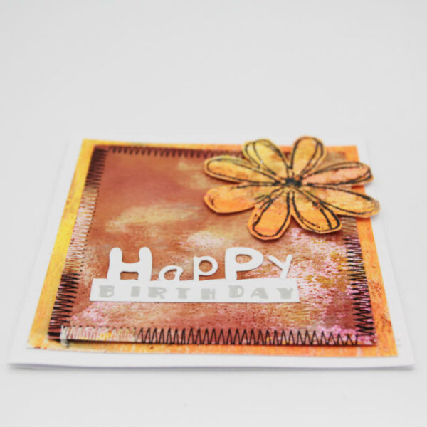 Top of orange daisy card