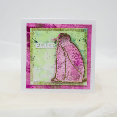 Heartwarming Pink Penguin Christmas Card