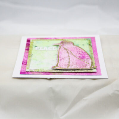 Heartwarming Pink Penguin Christmas Card
