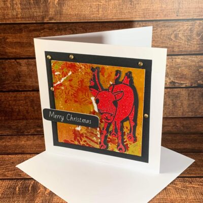Cheerful Embossed Red Reindeer with Snowflake Detail