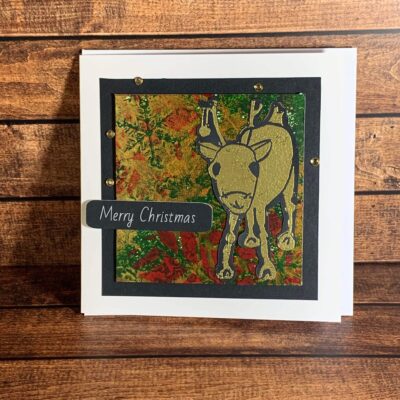 Dazzling Gold Reindeer with Bauble on Festive Print