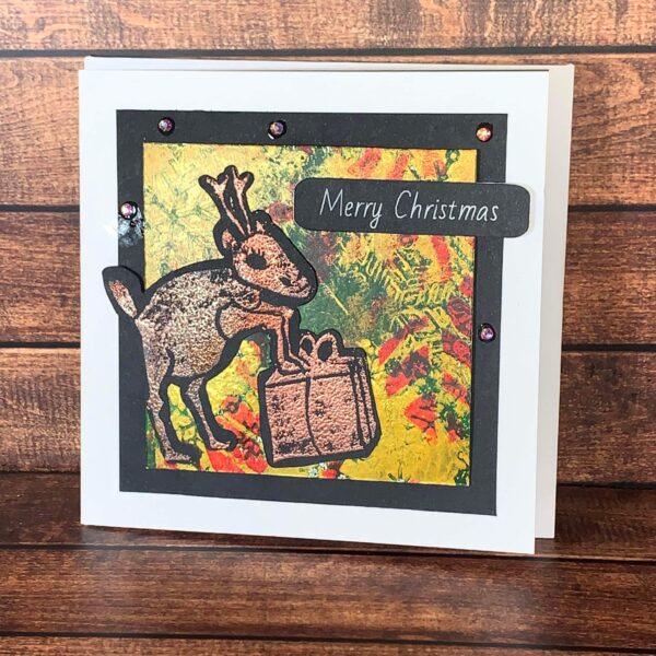 Copper Reindeer with Present with Abstract Snowflake Print Front