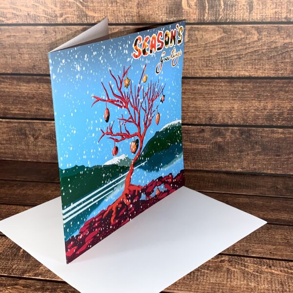 View of spine of Christmas card with tree on